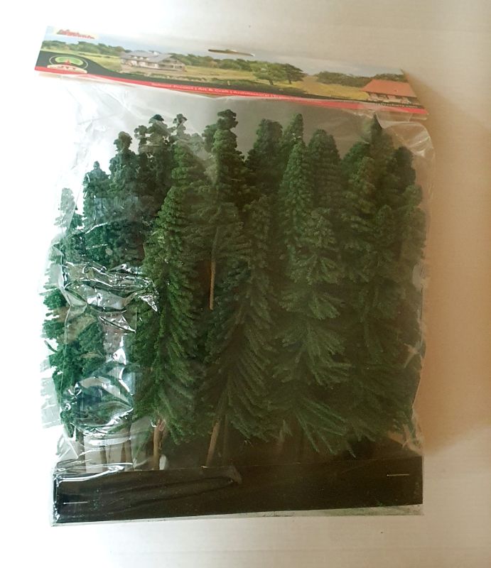 Set of realistic JJT Conifer Spruce trees, height ranges from 63mm to 152mm, ideal for model railways and dioramas.