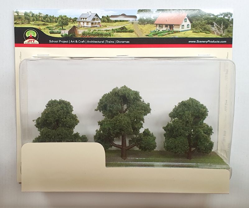 Three sun-kissed deciduous trees, 3-4 inches tall, enhancing model landscapes with vibrant colors and intricate details.