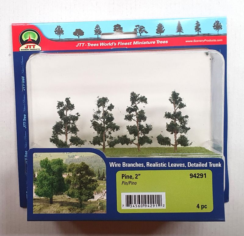 Four realistic 50.8mm pine trees for enhancing model landscapes and dioramas, made from high-quality materials.
