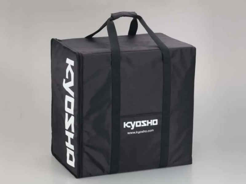 Large Kyosho carry bag for 1/8 RC vehicles, featuring durable materials, multiple compartments, and padded straps.