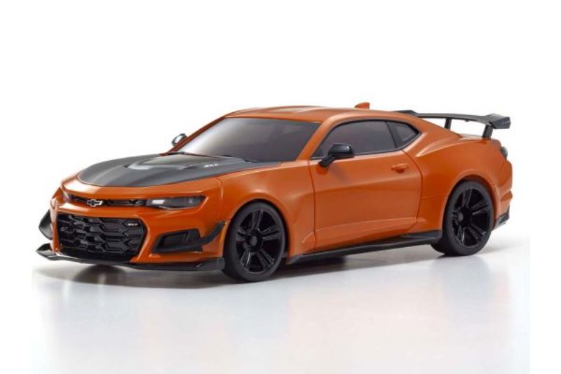 Kyosho MR-03W body shell in vibrant Corvette Orange, designed for customization and durability in RC racing.