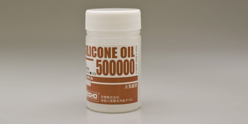 Kyosho Silicone Oil #500,000 (40cc) bottle for optimal damping in RC vehicles, enhancing shock absorber performance.