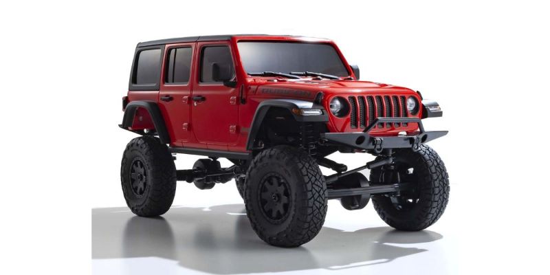 Kyosho MX-01 Wrangler Unlimited Red RC car with detailed bodywork, off-road capabilities, and 4x4 chassis for adventure.
