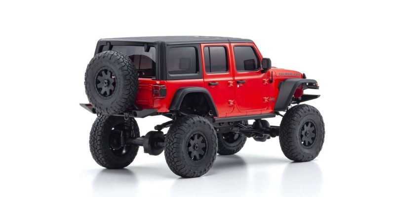 Kyosho MX-01 Wrangler Unlimited in red, a mini 4x4 RC crawler with robust off-road design and detailed bodywork.