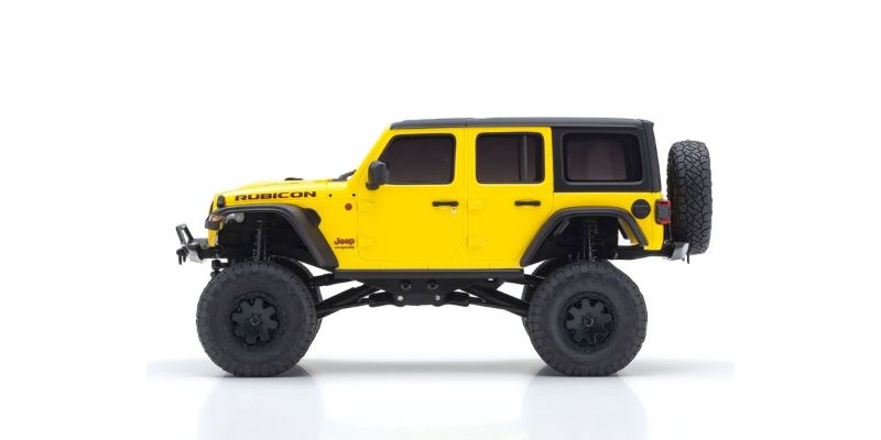Kyosho MX-01 Wrangler Unlimited Yellow RC vehicle with 4x4 chassis, perfect for rugged terrains and detailed design.