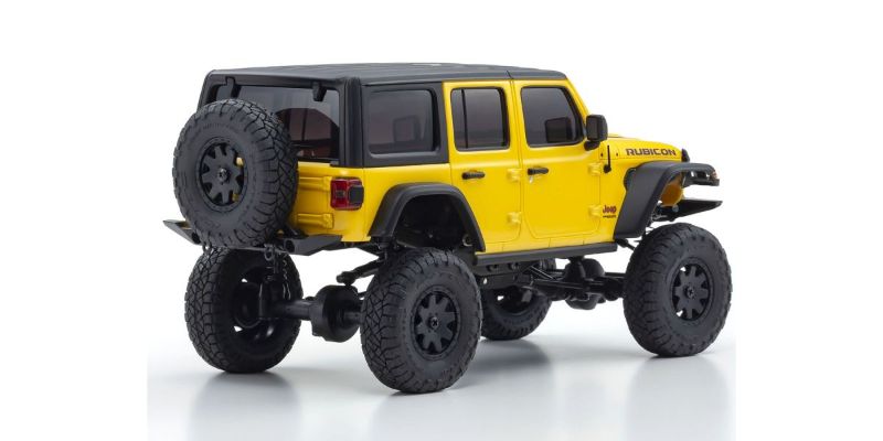 Kyosho MX-01 Wrangler Unlimited Yellow RC car with 4x4 chassis, detailed design, and customizable gear options for off-road adventures.