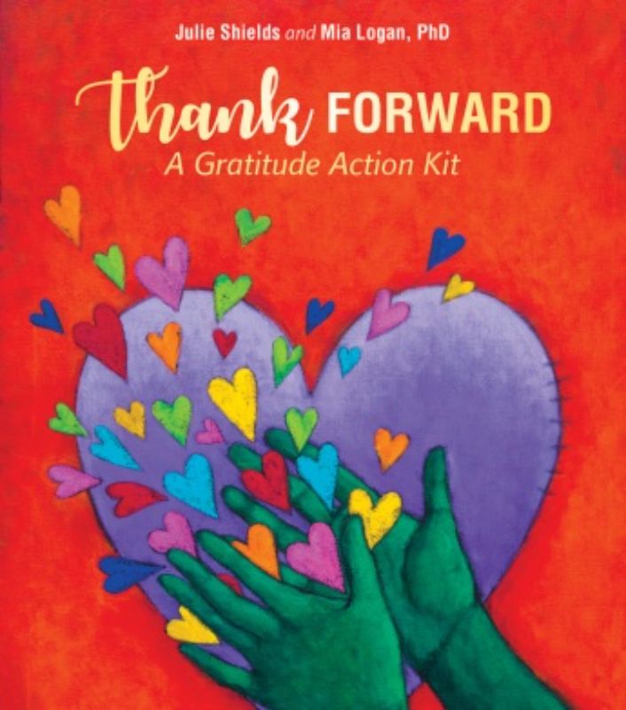 Colorful gratitude action kit with 21 cards promoting kindness and joy, accompanied by an inspiring guide.