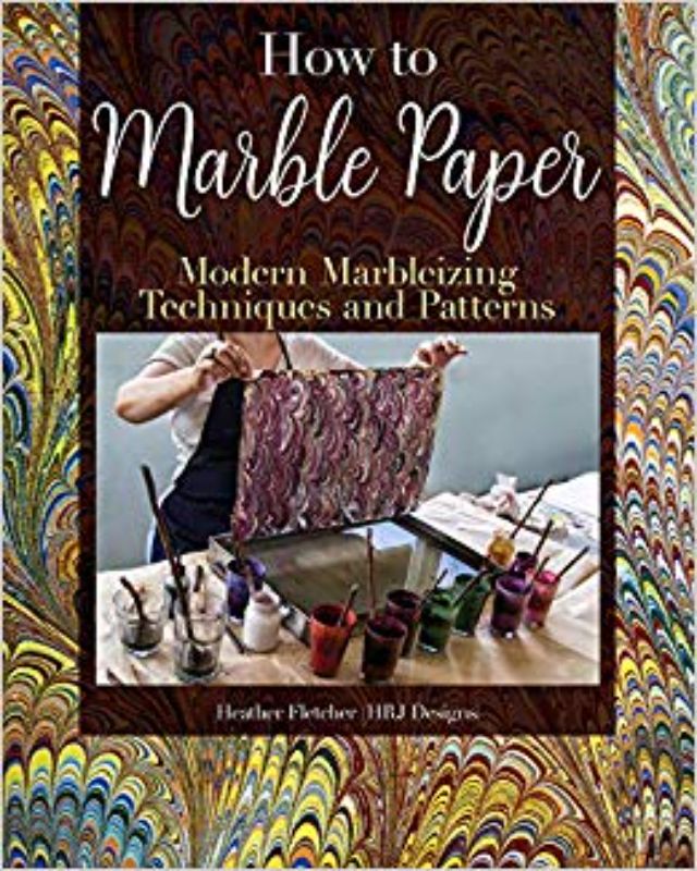 Guide to marbling paper featuring 30+ patterns and step-by-step techniques for creating unique artworks.