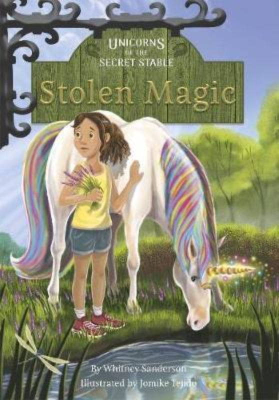 Book cover of 'Unicorns of the Secret Stable: Stolen Magic', featuring a whimsical unicorn amidst a colorful, enchanted landscape.