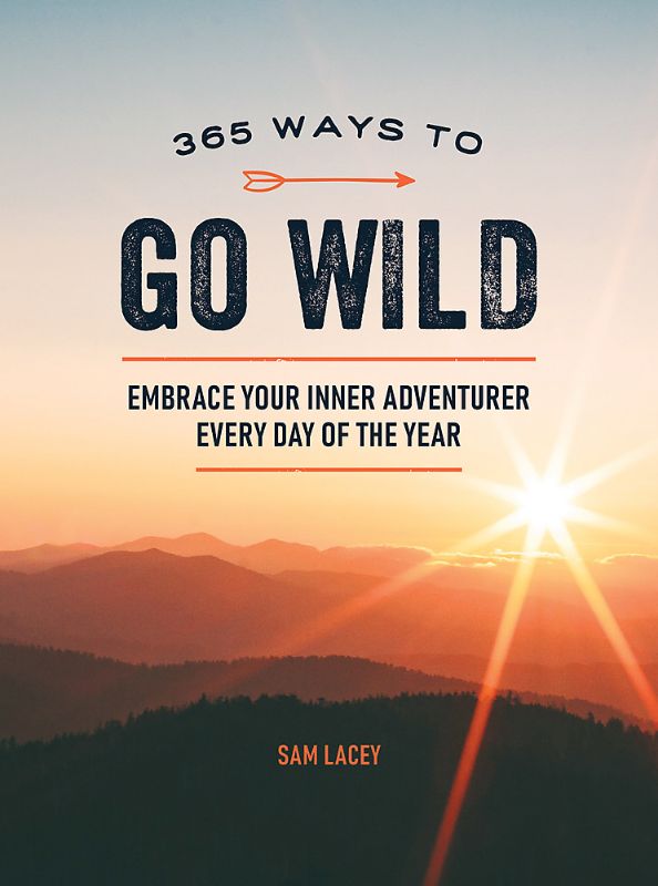 A compact guidebook titled '365 Ways To Go Wild' filled with outdoor adventures and creative nature activities.