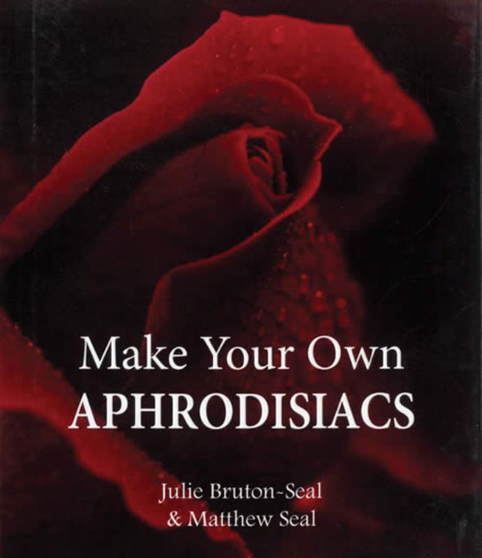Enchanting cookbook featuring aphrodisiac recipes with herbs, spices, fruits, and flowers for romantic experiences.