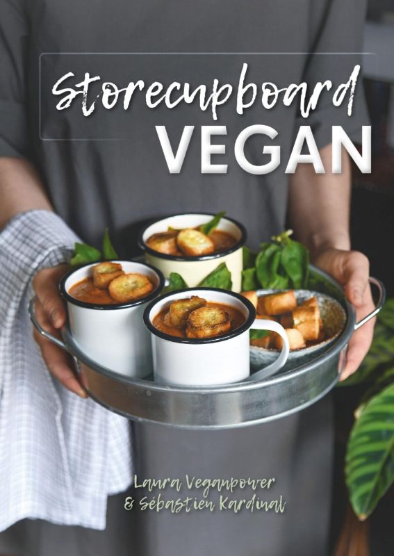 Essential vegan cookbook with 300 quick recipes for urban dwellers, featuring convenient ingredients like frozen veggies.