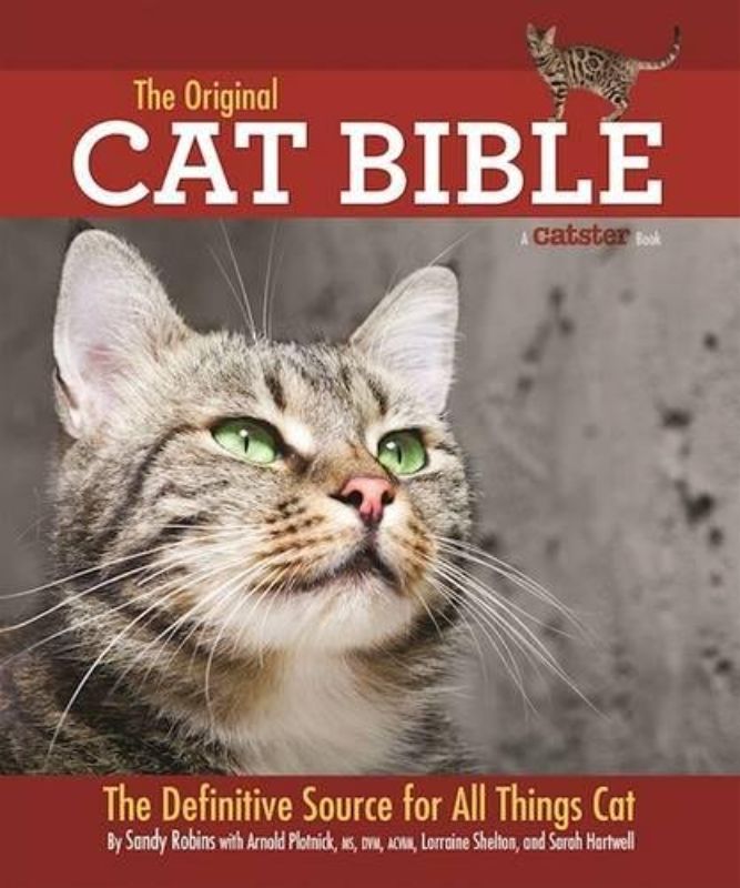 The Original Cat Bible: A comprehensive 544-page guide for cat owners, featuring care tips, breed profiles, and history.