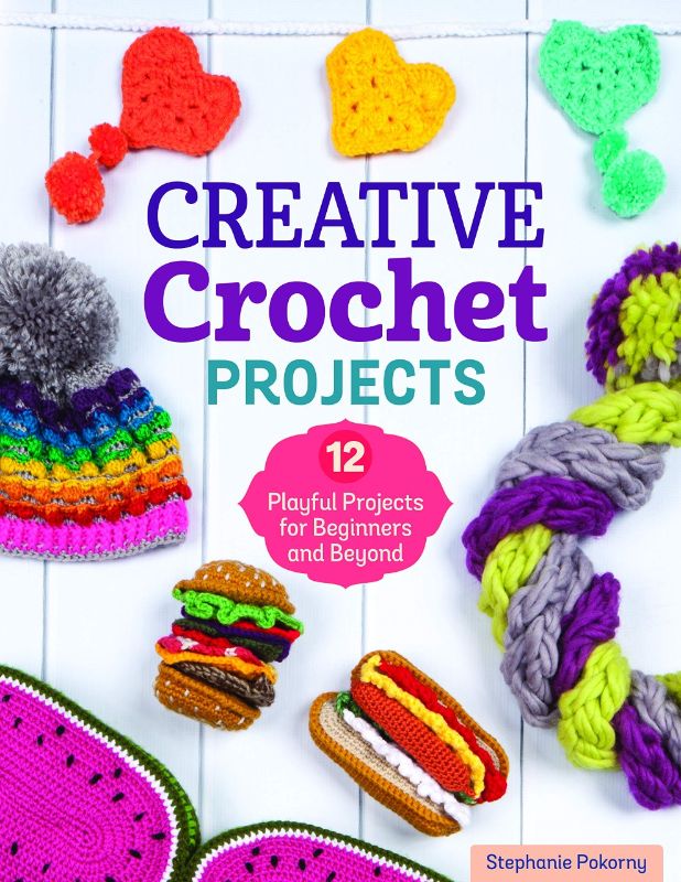 Colorful crochet book featuring 12 unique projects for all skill levels, including mobiles and playful decor items.