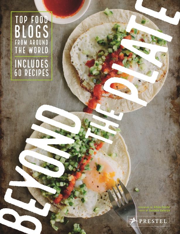 Vibrant global cookbook featuring 30 food blogs with diverse recipes and personal stories, beautifully illustrated.