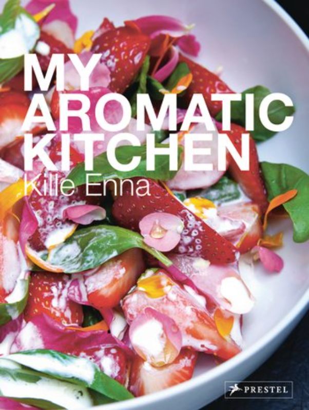 A beautifully curated cookbook featuring 50 organic recipes by Kille Enna, highlighting spices and seasonal ingredients.