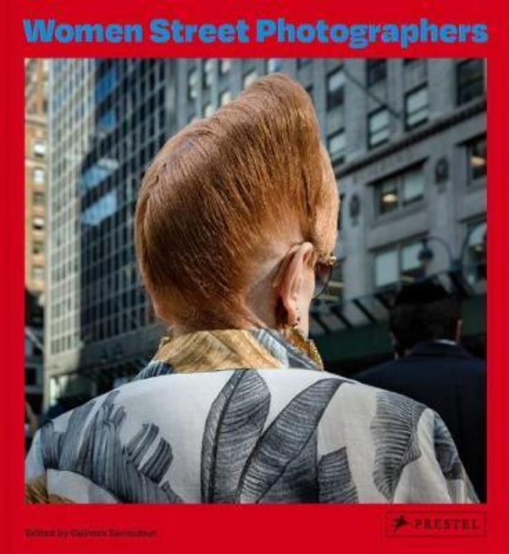 Hardcover book showcasing diverse street photography by 100 contemporary women artists, featuring personal insights and compelling images.
