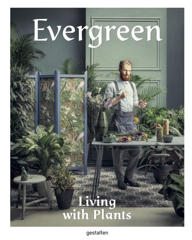 A hardcover guidebook titled 'Evergreen' featuring urban gardening ideas and vibrant plant photography for city dwellers.