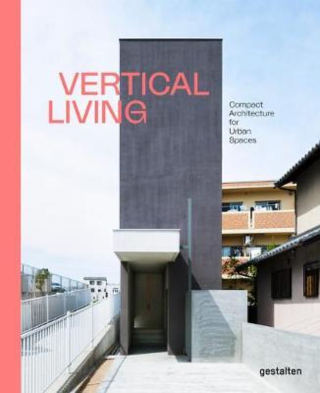 Hardback book 'Vertical Living' showcasing modern architecture for compact urban spaces with stylish design solutions.