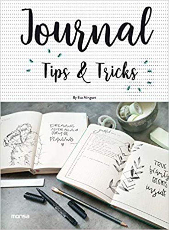 Hardback guidebook on journaling tips, featuring techniques from 17 experts to personalize and organize your journal.