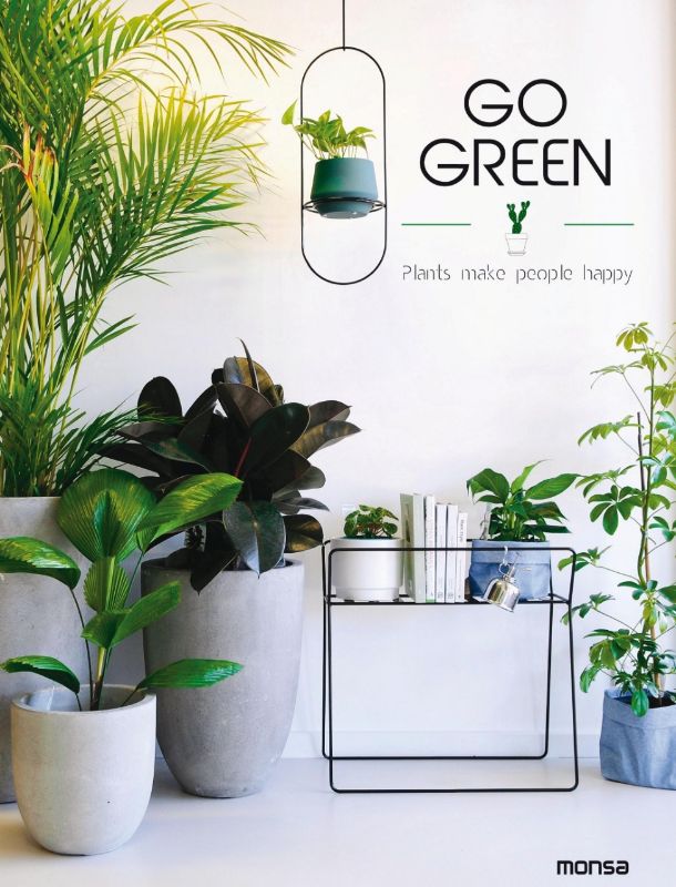 Hardback book 'Go Green' exploring indoor gardening, featuring 144 pages of plant care tips and vibrant imagery.