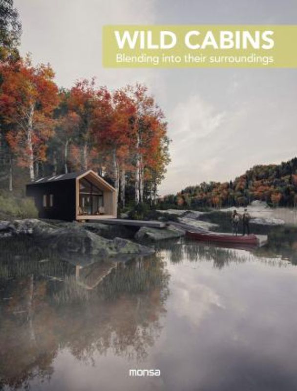 Hardback book 'Wild Cabins' featuring stunning cabin designs, showcasing luxury and nature for all-season escapes.