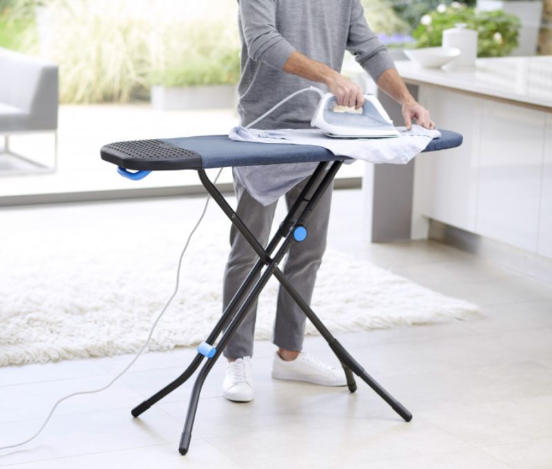 Joseph Joseph Glide Plus Easy-store Ironing Board in Black/Blue, compact design with ergonomic handle for easy transport.