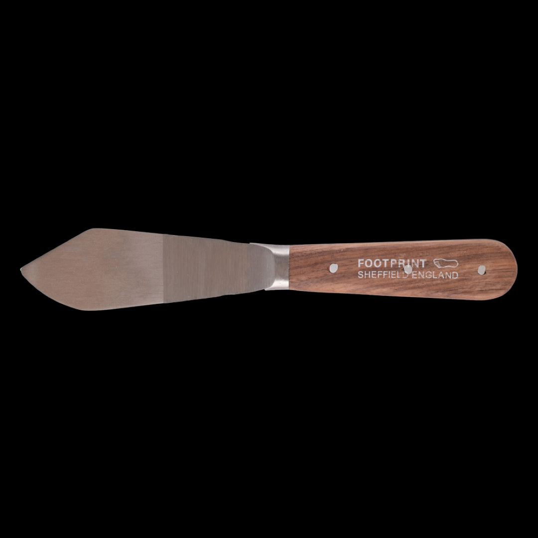 FOOTPRINT Putty Knife with ergonomic handle and precision blade for flawless filling and smoothing in DIY projects.