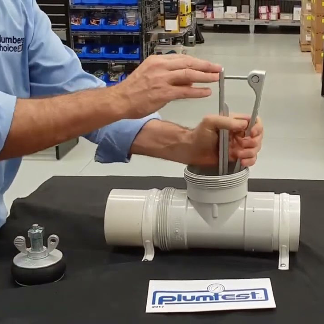 PLUMTEST 100mm Right Angled Test Plug, designed for safe and efficient plumbing tests with durable cast aluminum construction.