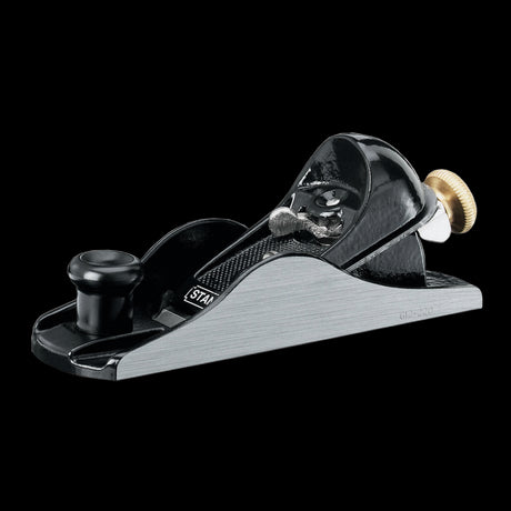 STANLEY Block Plane: 9-inch tool designed for precision planing with ergonomic handle for comfort and depth control.