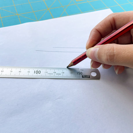 TOLEDO 150mm stainless steel rule with double-sided metric and imperial measurements for precision and durability.