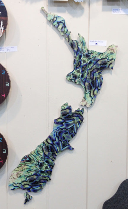 Stunning NZ Paua Wall Art showcasing vibrant coastal colors, crafted from durable ACM, perfect for any indoor or outdoor space.