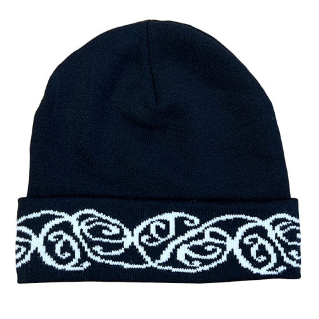 Black beanie with white M?ori pattern, perfect for winter warmth and showcasing cultural heritage.