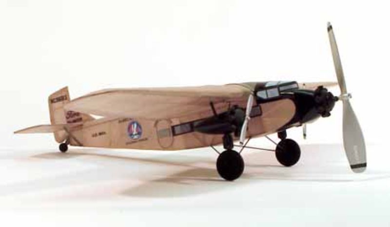 Balsa Glider Kit featuring 17 1/2" Ford Tri-Motor with 50+ laser-cut parts, lightweight balsa construction, and vibrant decals.