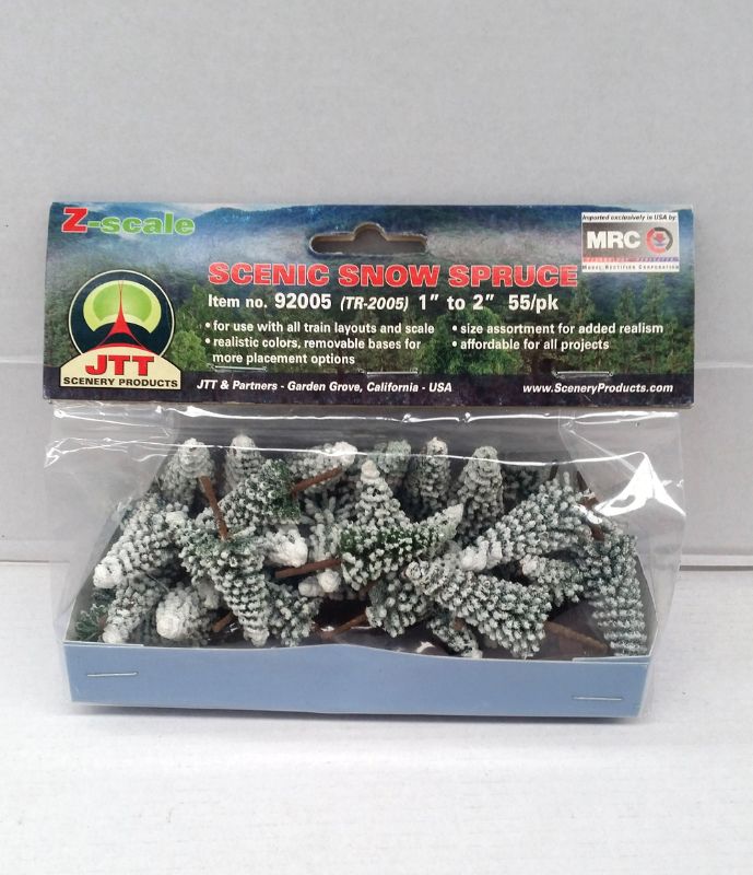 55 intricately designed snow-covered pine trees, 25-51mm tall, perfect for winter model landscapes and dioramas.