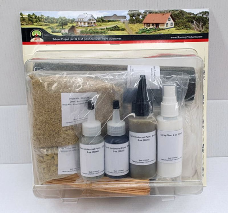 Versatile landscaping terrain set with asphalt turf, realistic paints, and tools for creating dioramas and miniature landscapes.