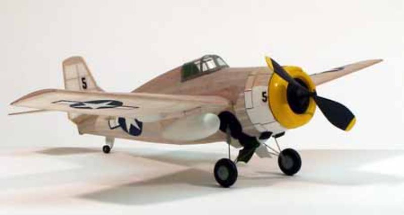 Balsa wood F-4F Wildcat glider kit with 44cm wingspan, precision parts, easy assembly, and vibrant customization options.