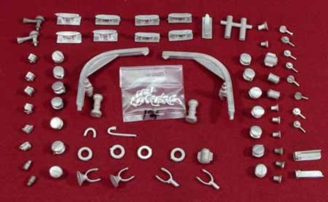 Wooden Ship Fittings kit with crafted components like bullseyes, cleats, and fairleads for model ship builders.