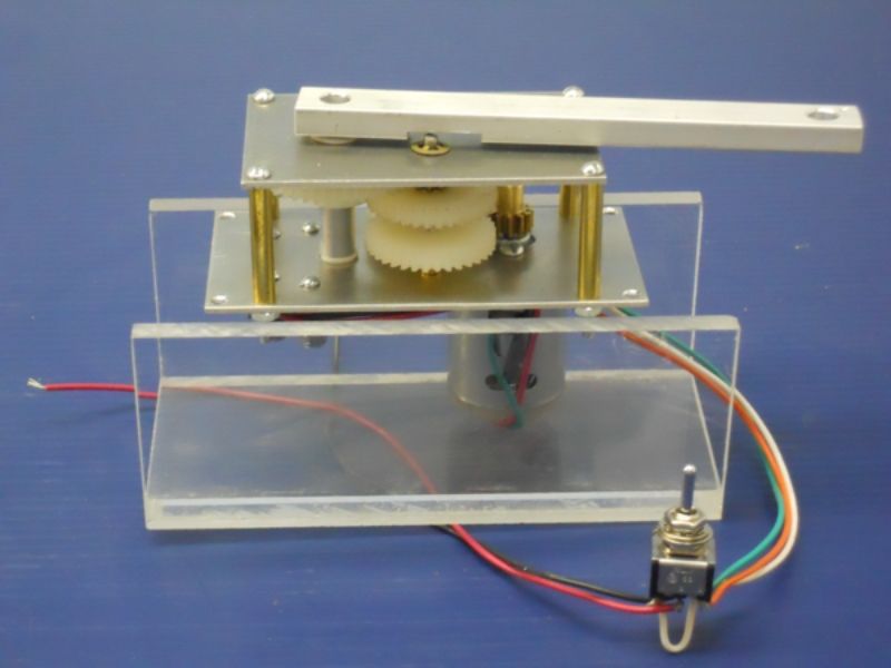 Wooden Sail Control Unit for boats under 700 sq. in., enhances performance with quick, simultaneous jib and mainsail control.