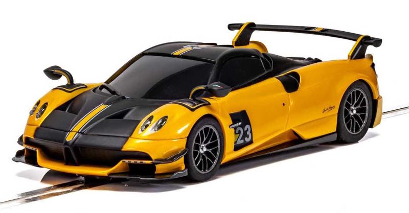 Scalextric Pagani Huayra Roadster BC in vibrant yellow, showcasing exquisite details and racing performance features.
