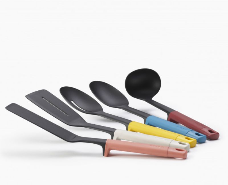 Joseph Joseph Elevate Store Utensil Set with weighted handles, integrated tool rests, and heat-resistant heads for hygienic cooking.