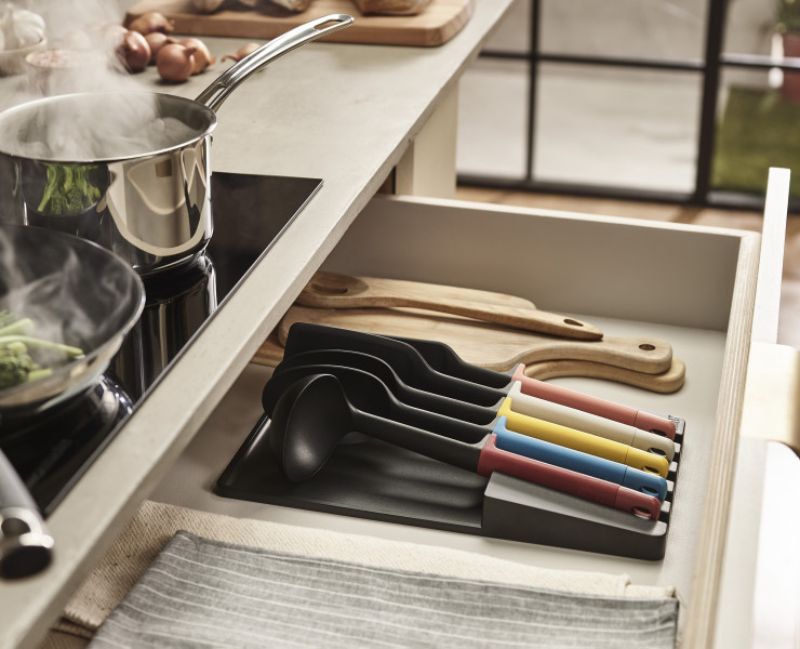 Joseph Joseph Elevate Store Utensil Set with ergonomic handles, heat-resistant heads, and organized in-drawer tray for hygienic cooking.