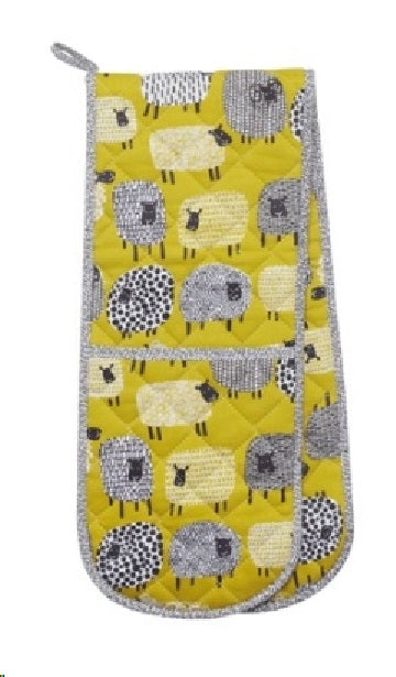 Oven mitts featuring whimsical Dotty Sheep design by Ulster Weavers, crafted from high-quality linen for optimal heat protection.
