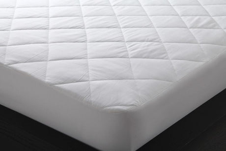 Cotton mattress protector for king single bed with quilted diamond design, offering comfort and protection against spills and allergens.