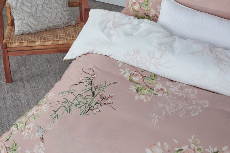Elegant King Duvet Cover Set in MIZUMI BLUSH with floral design and white piping for a serene bedroom ambiance.