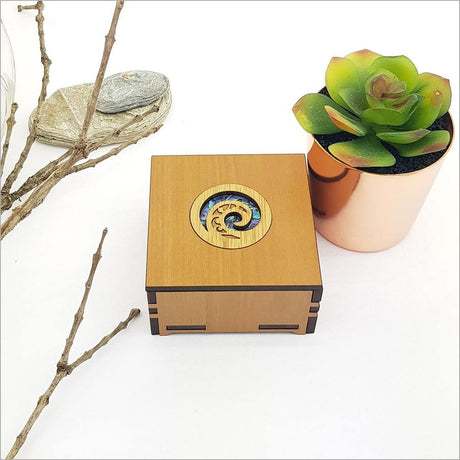 Small Koru trinket box with NZ Paua inlay, perfect for storing jewelry and treasures, symbolizes growth and harmony.