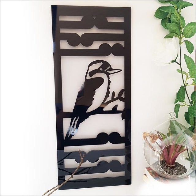 Kiwiana Wall Art featuring a Kingfisher and Koru symbol, available in Black and Brushed Silver, for indoor/outdoor use.