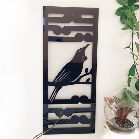 Kiwiana wall art panel featuring Tui and Koru design, crafted in Black and Brushed Silver, ideal for indoor or outdoor use.