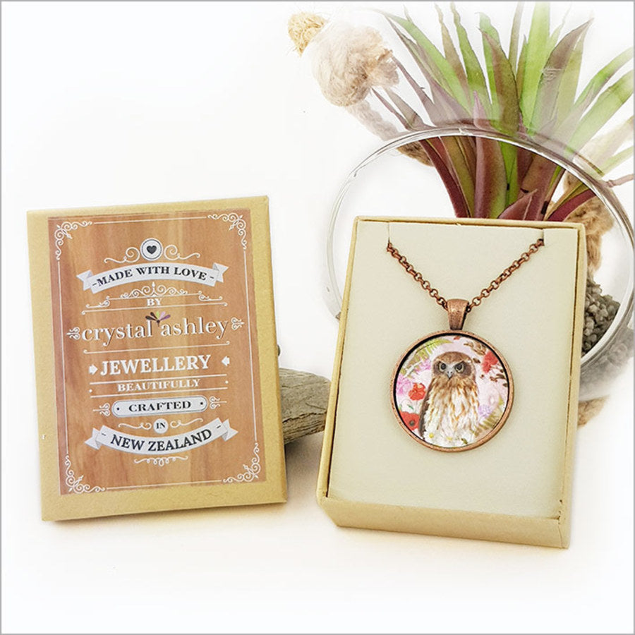 Floral Ruru Morepork Circle Necklace with MOP pendant, 30mm, antique copper finish, on a 75cm chain, presented in a gift box.