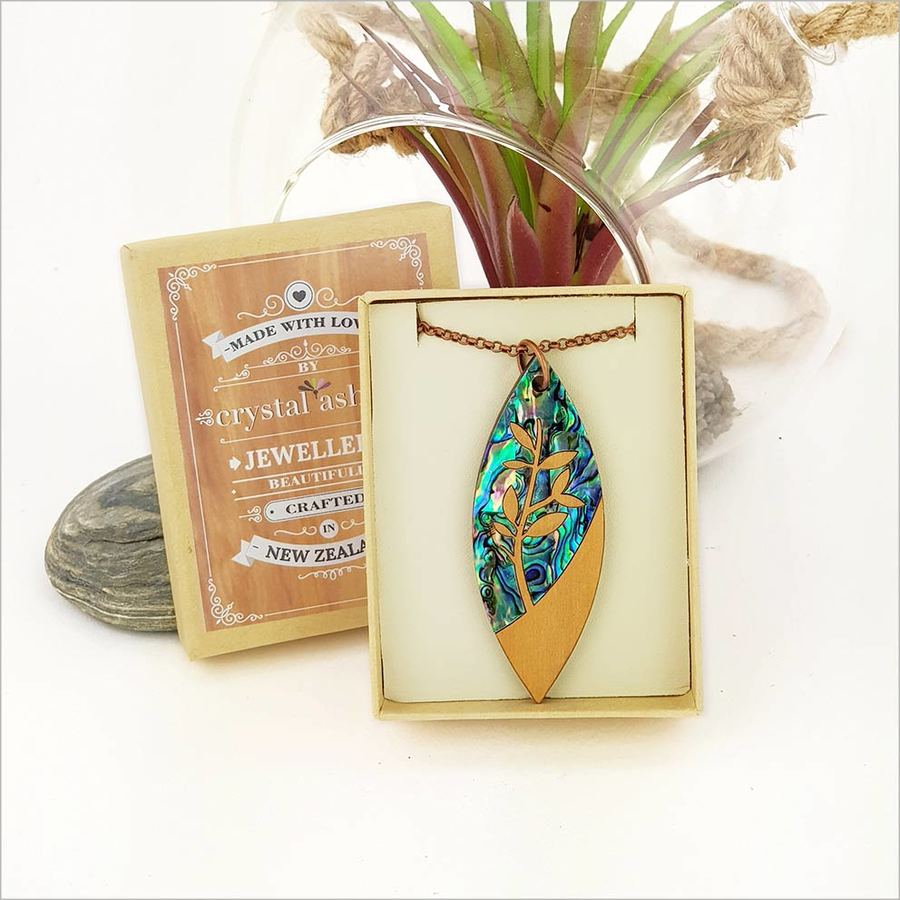 Rimu Necklace with Leaf design, featuring Paua inlay, eco-friendly wood, 75cm chain, and gift box.